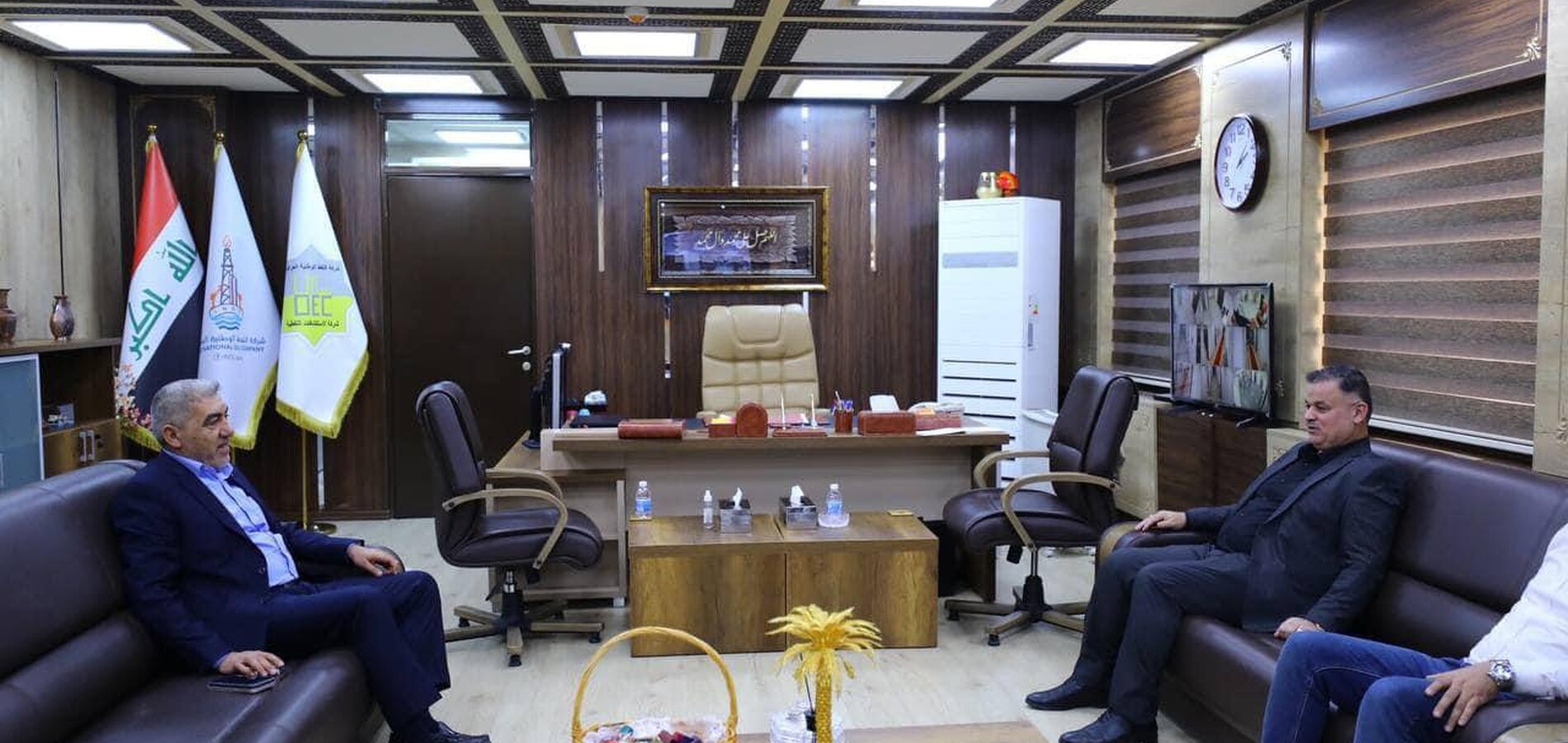 The Director General of the Oil Exploration Company exchanges congratulations and blessings with the Director General of Maysan Oil Company